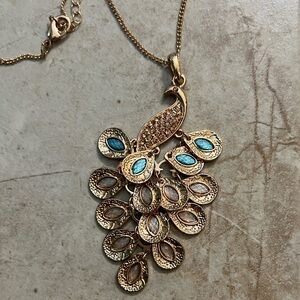 Elegant Gold and Blue Peacock Pendant Necklace
